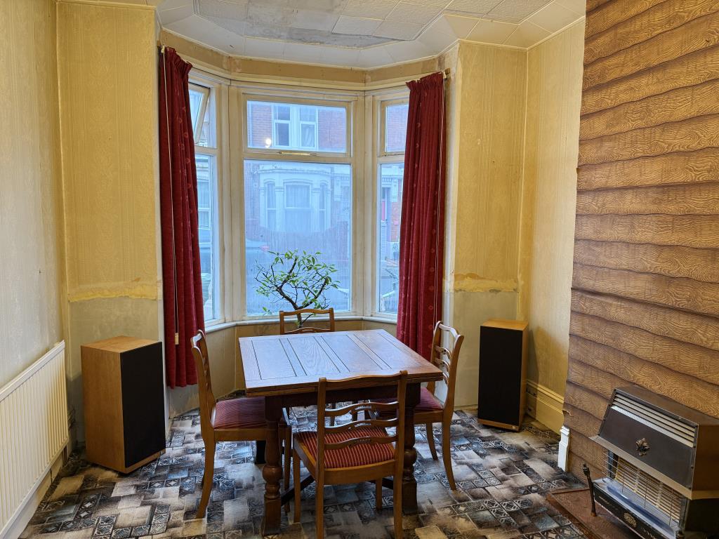 Lot: 147 - THREE-BEDROOM HOUSE IN NEED OF IMPROVEMENT - Living room with gas fire and pattern carpet